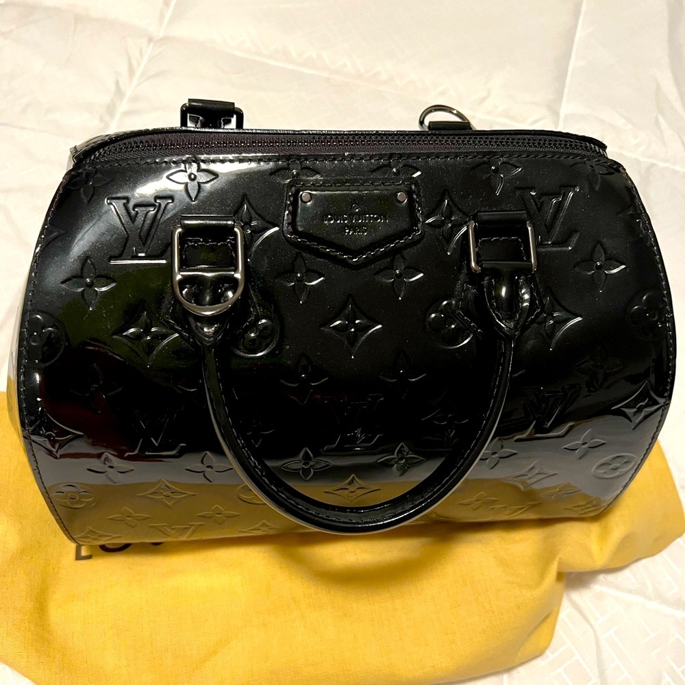 Authentic Louis Vuitton vintage leather handbag.